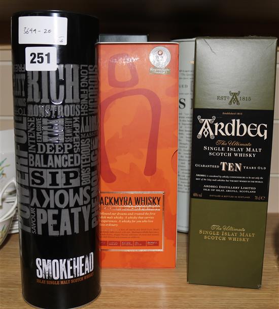 Five assorted bottles of whisky: Ardbeg 10yo, Lagavulian 16yo, Smoke Head, Waitrose Islay 10yo and Mackmyra